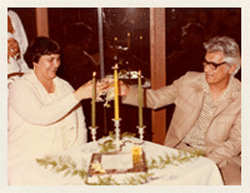 Doreen and Frank raise a toast